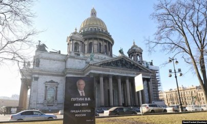 Putinin şəklini məzarlığa vuran 3 fəal saxlanıb