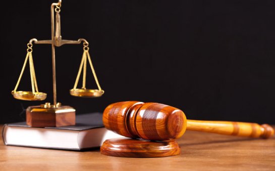 Məmur kürəkəninə prokuror 12 il həbs istədi, məhkəmə bəraət verdi